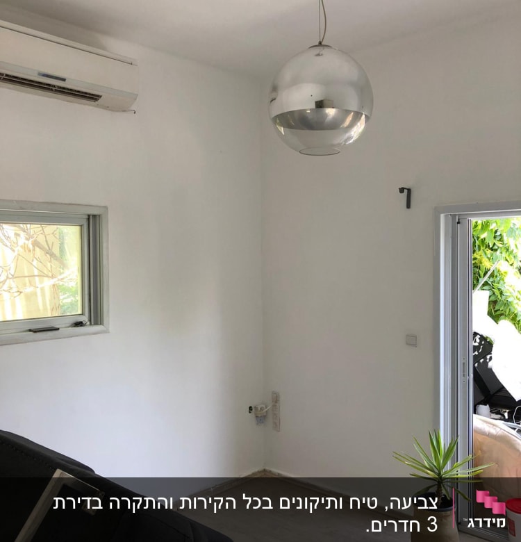 קיר לבן עם סימני צבע טריים